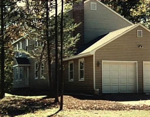 10 Winding Brook Road Newtown, CT 06470 - Photo 1 of 1 a view of a house with a yard