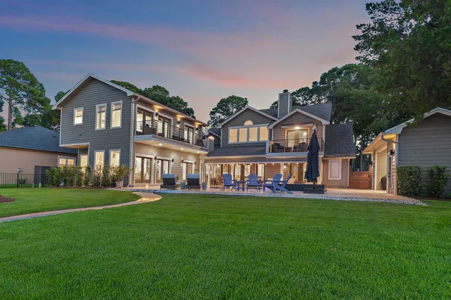 a front view of building with yard and green space