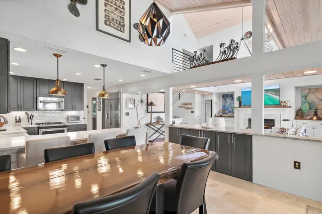 a bedroom with a bed wooden floor and window