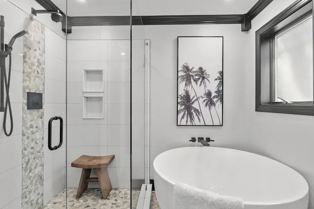 a bathroom with a sink vanity mirror and toilet