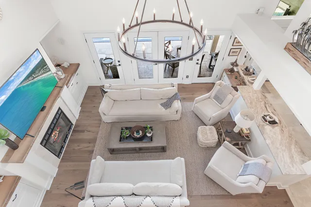 a bedroom with a bed a dresser and a window