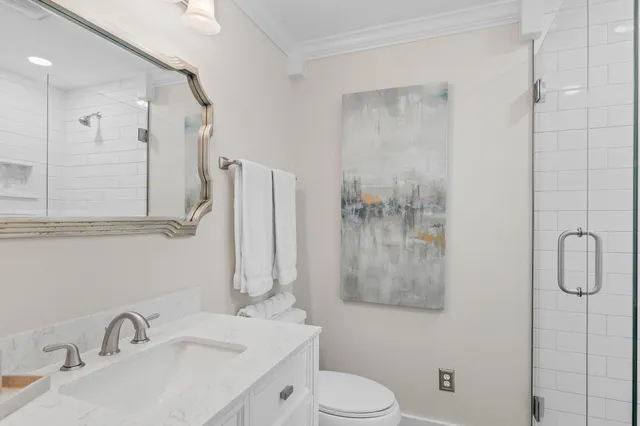 a dining room with furniture a chandelier and window
