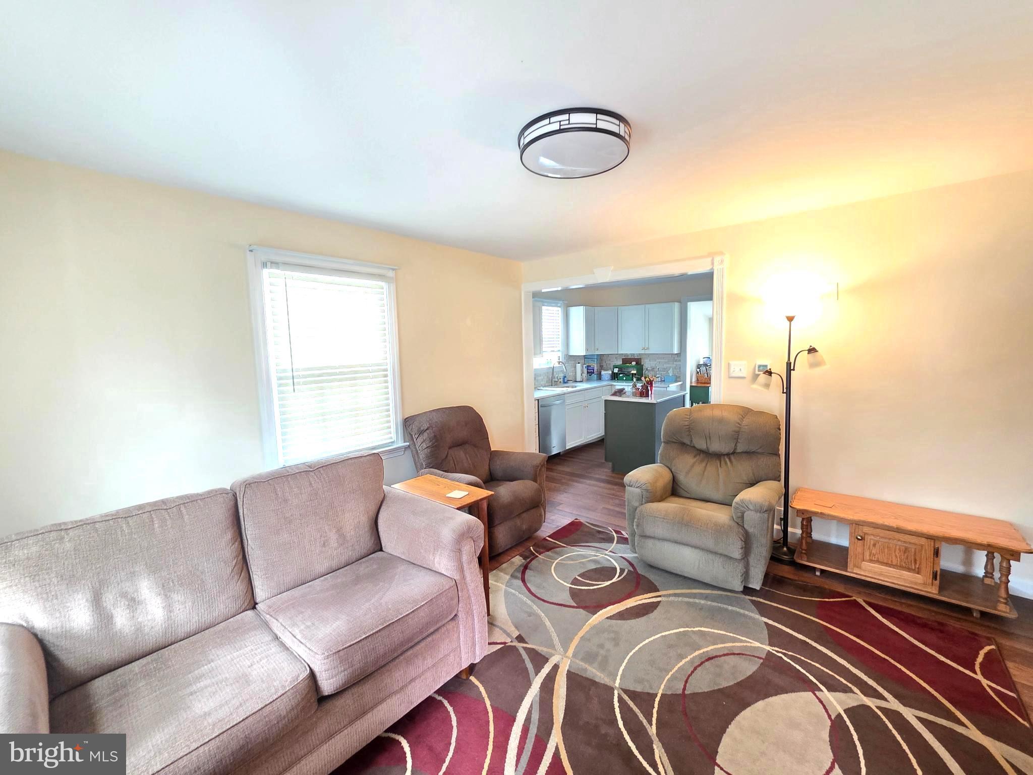 27 George Street Mount Ephraim, NJ 08059 - Photo 5 of 27 a living room with furniture and a large window