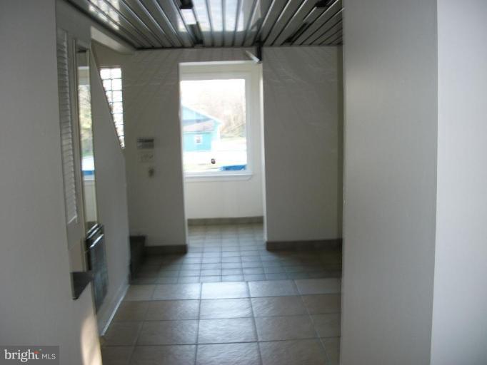 2409 Cool Spring Road Adelphi, MD 20783 - Photo 10 of 24 a view of an empty room with a window