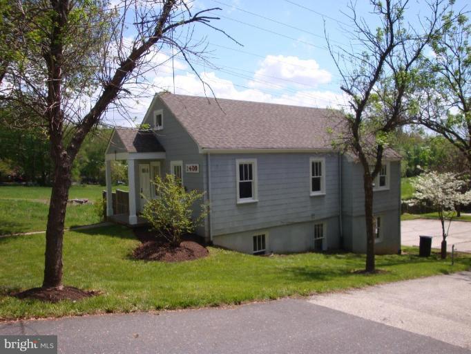2409 Cool Spring Road Adelphi, MD 20783 - Photo 19 of 24 a front view of house with a garden
