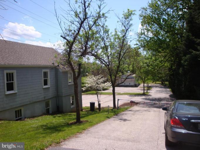 2409 Cool Spring Road Adelphi, MD 20783 - Photo 20 of 24 a view of a street with a car parked side of it