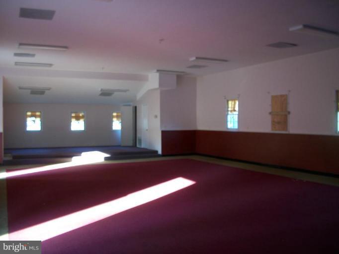 2409 Cool Spring Road Adelphi, MD 20783 - Photo 8 of 24 a view of an empty room with a window
