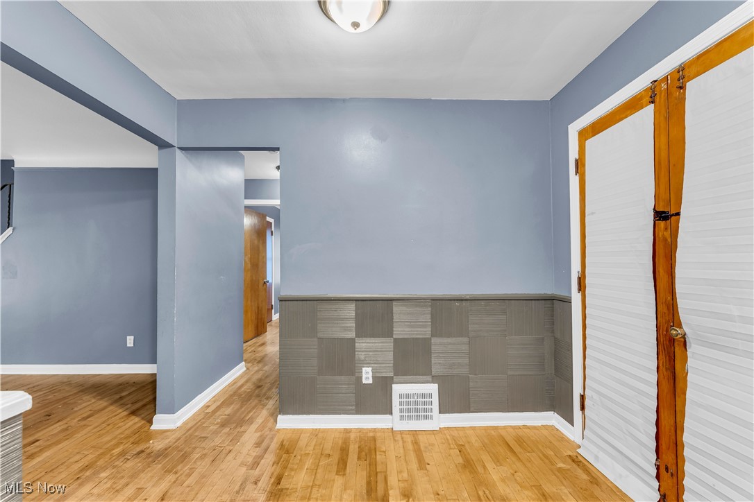 968 South Green Road Cleveland, OH 44121 - Photo 9 of 25 Unfurnished room featuring light wood-type flooring