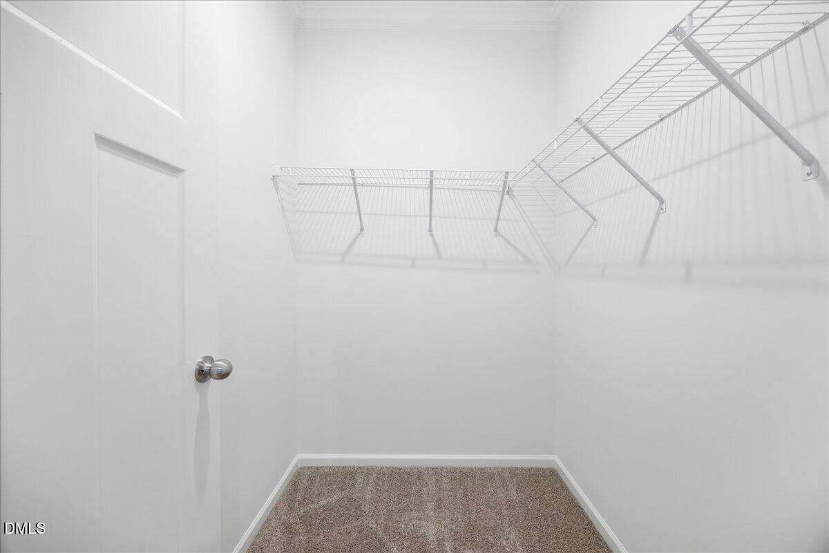 105 Buck Ridge Road Louisburg, NC 27549 - Photo 13 of 32 Primary closet