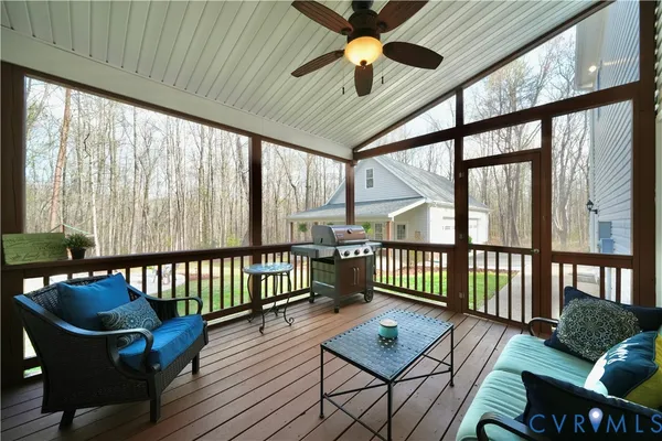 a view of entryway and hall with a front door