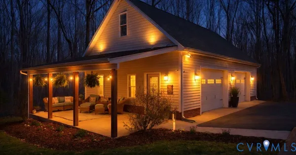 a large kitchen with stainless steel appliances granite countertop a sink and cabinets
