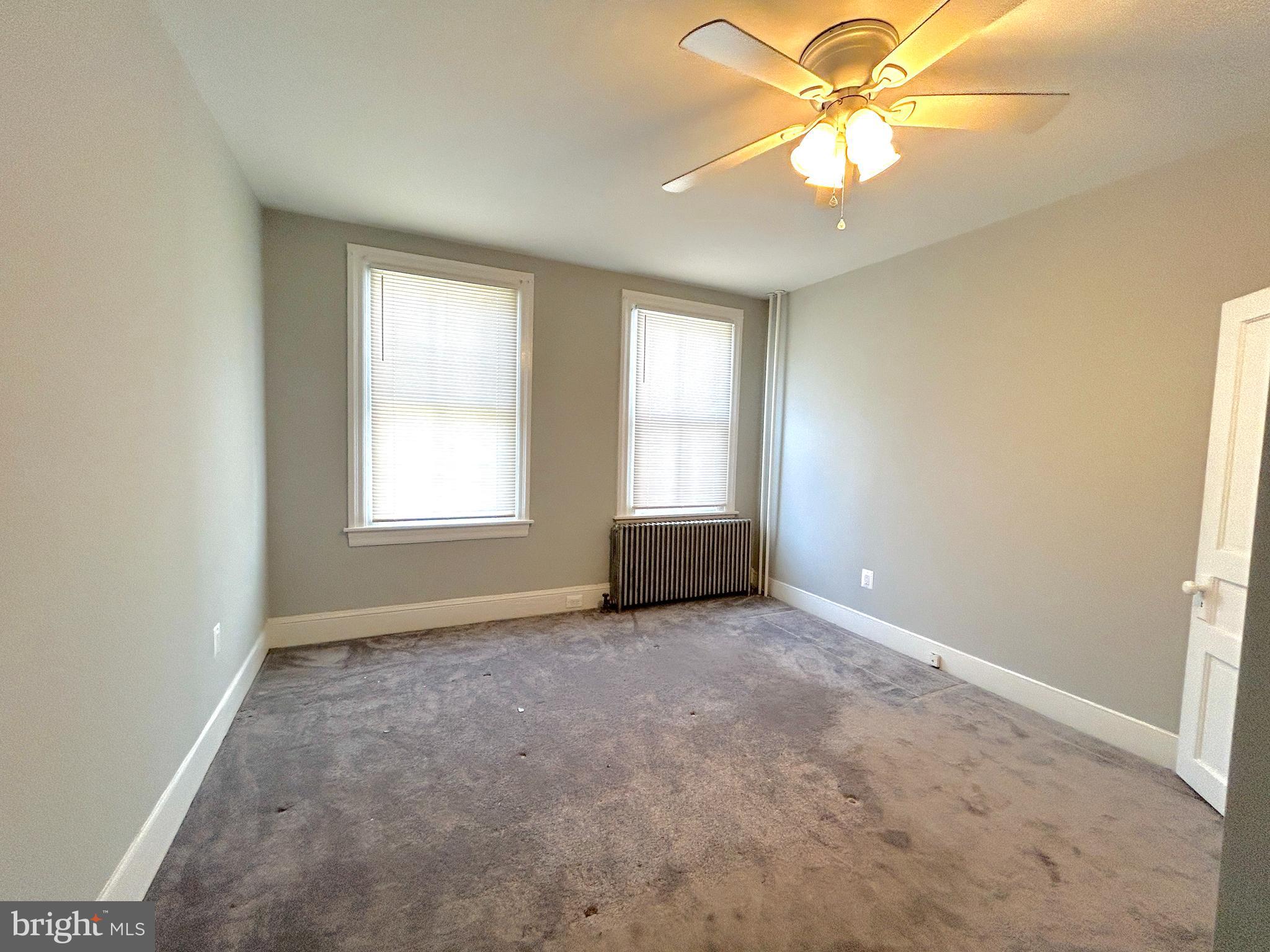 15 Level Road, Unit 5 Collegeville, PA 19426 - Photo 9 of 10 an empty room with windows and fan