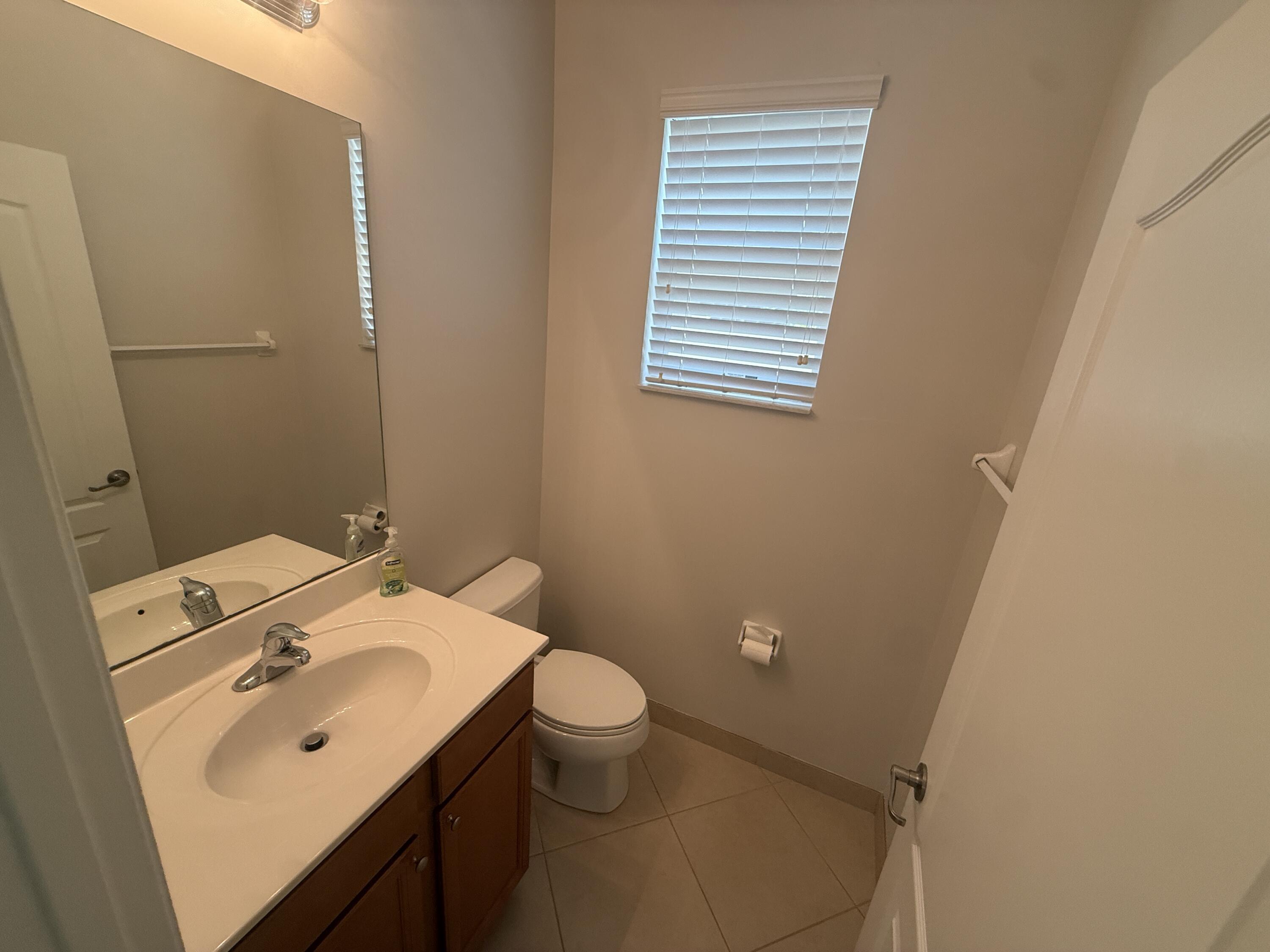 9519 Southwest Merlin Court Stuart, FL 34997 - Photo 9 of 26 Powder room