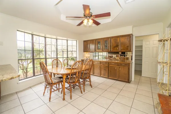 a dining room well furnished