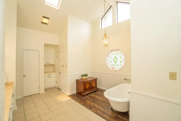 a bathroom with a toilet a sink and a shower