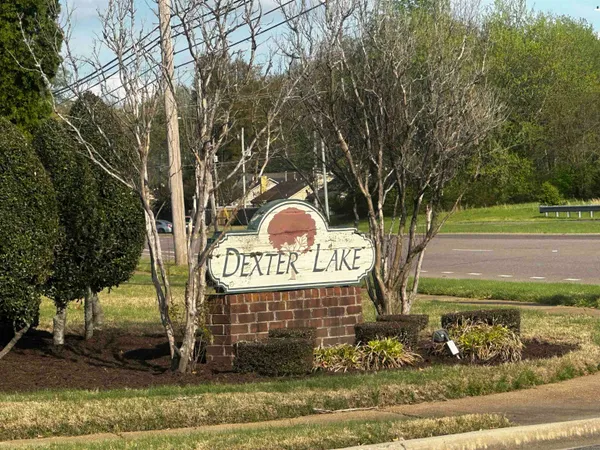 a sign that is on the side of a road