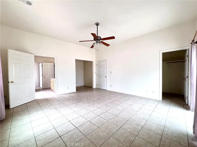 a bathroom with a tub a sink and a shower