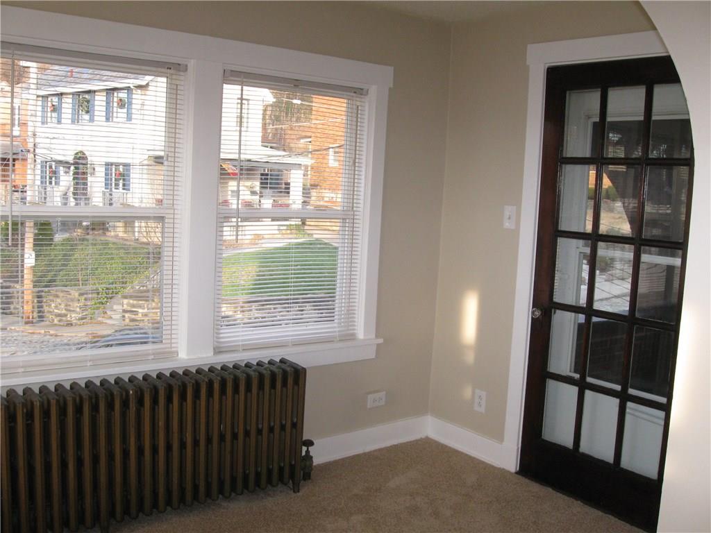 201 Richbarn Road Brighton Heights, PA 15212 - Photo 5 of 11 SECOND FLOOR SUNROOM LEADING TO THE BALCONY