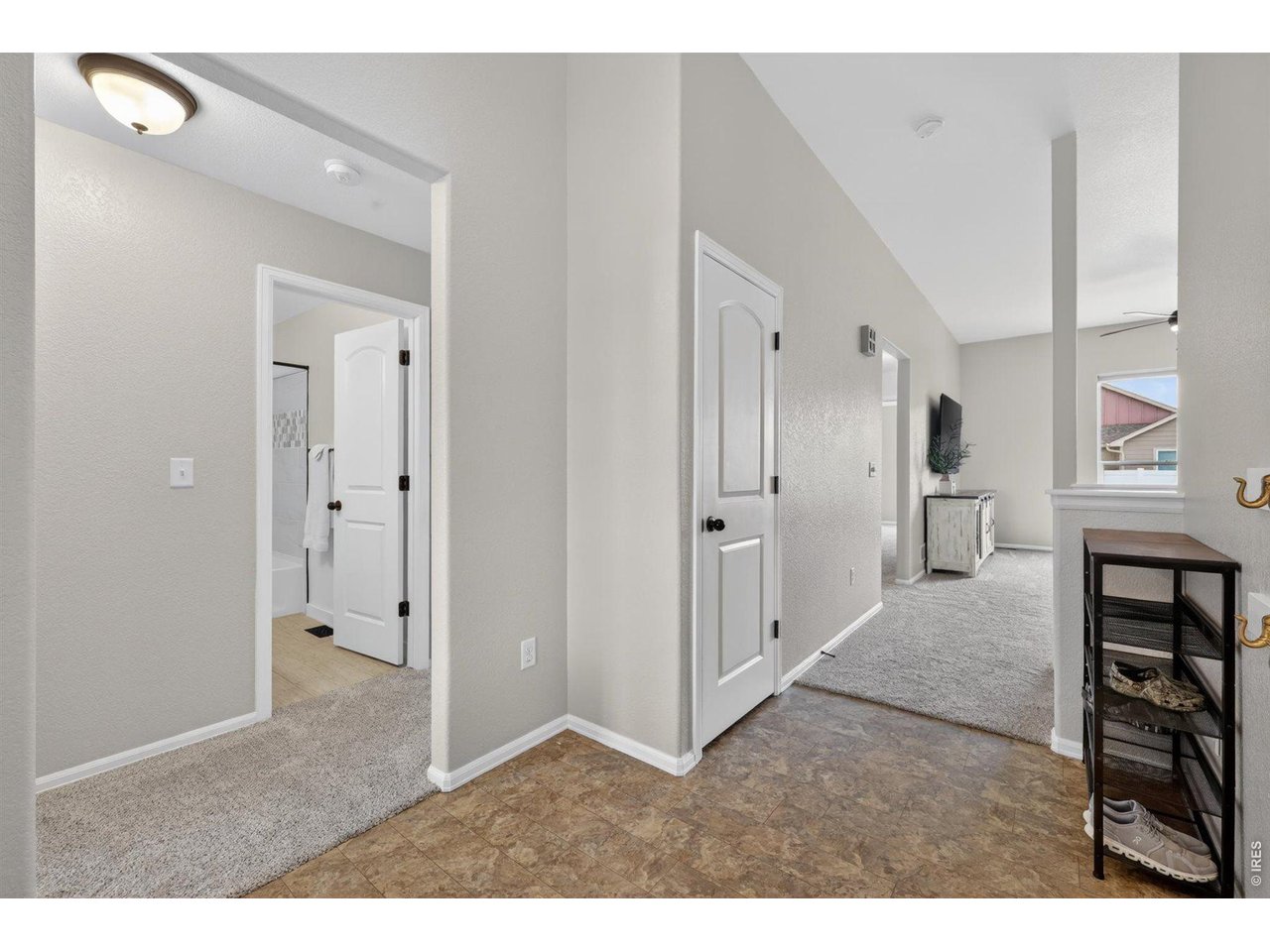 7545 McClellan Road Wellington, CO 80549 - Photo 4 of 42 Main level hallway leading to the inside