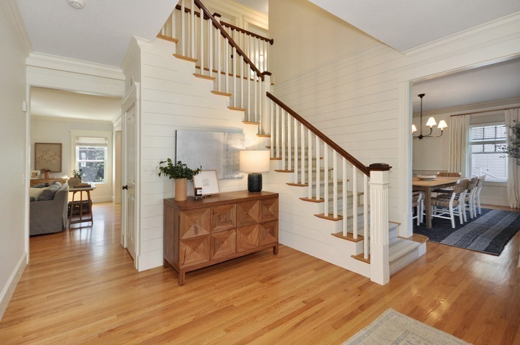 127 Revolutionary Road Concord, MA 01742 - Photo 3 of 27 a view of entryway and hall with wooden floor