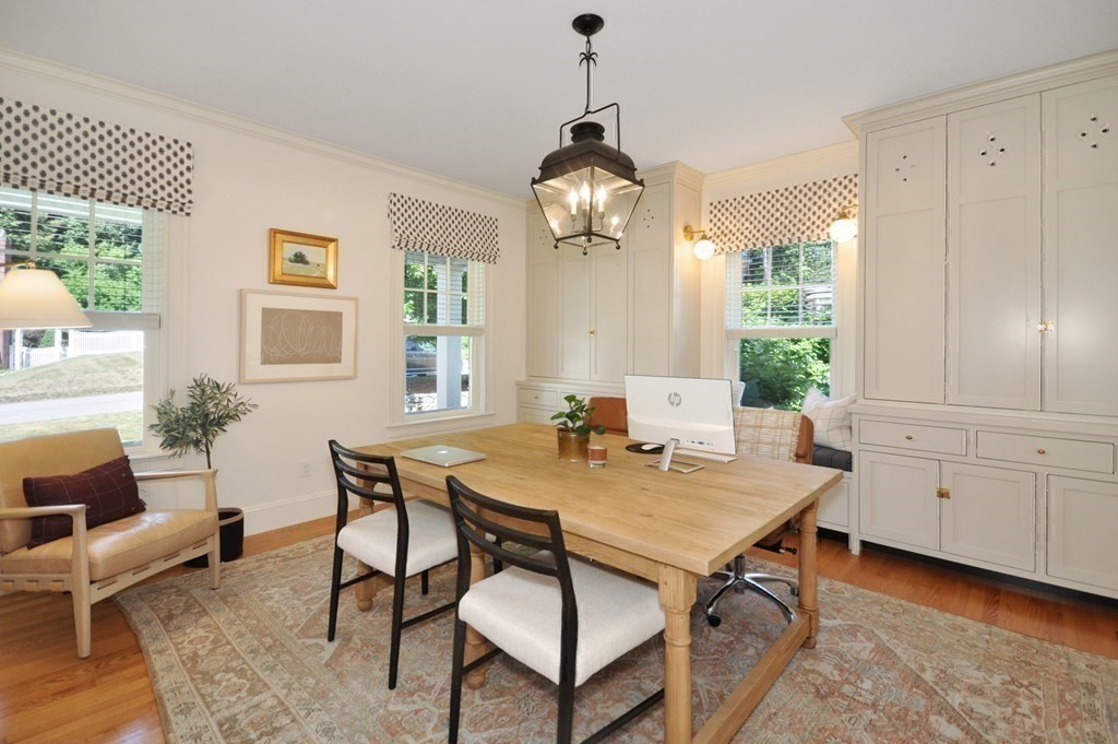 127 Revolutionary Road Concord, MA 01742 - Photo 8 of 27 a view of a dining room with furniture window and wooden floor