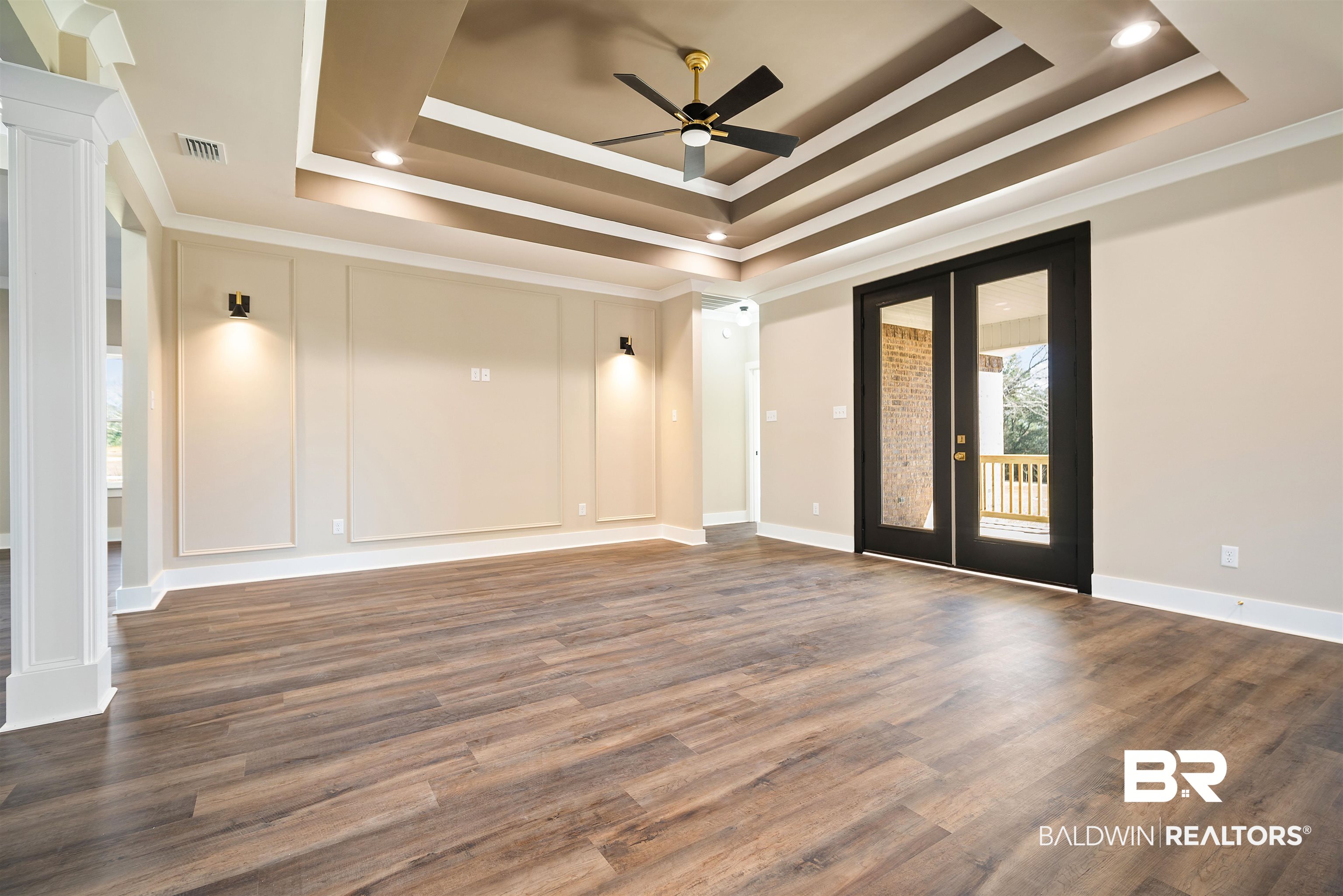 188 Hampton Ridge Mobile, AL 36608 - Photo 4 of 37 Family room with french doors, ceiling fan, crown molding, a tray ceiling, and LVP floors
