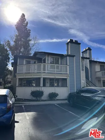 a front view of a building with street view