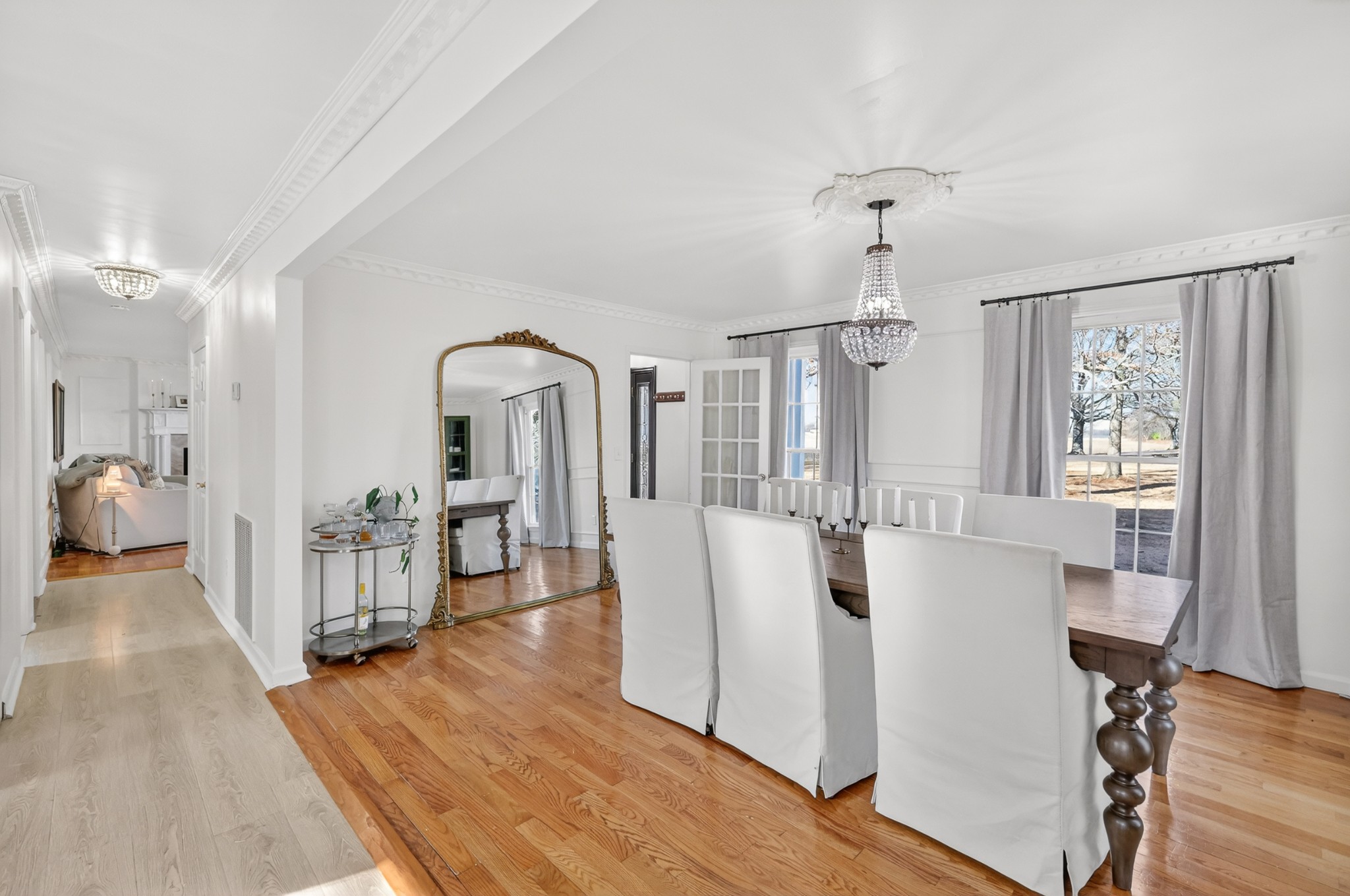 175 Dry Weakley Road Ethridge, TN 38456 - Photo 12 of 49 a living room with furniture a dining table wooden floor and a dining table