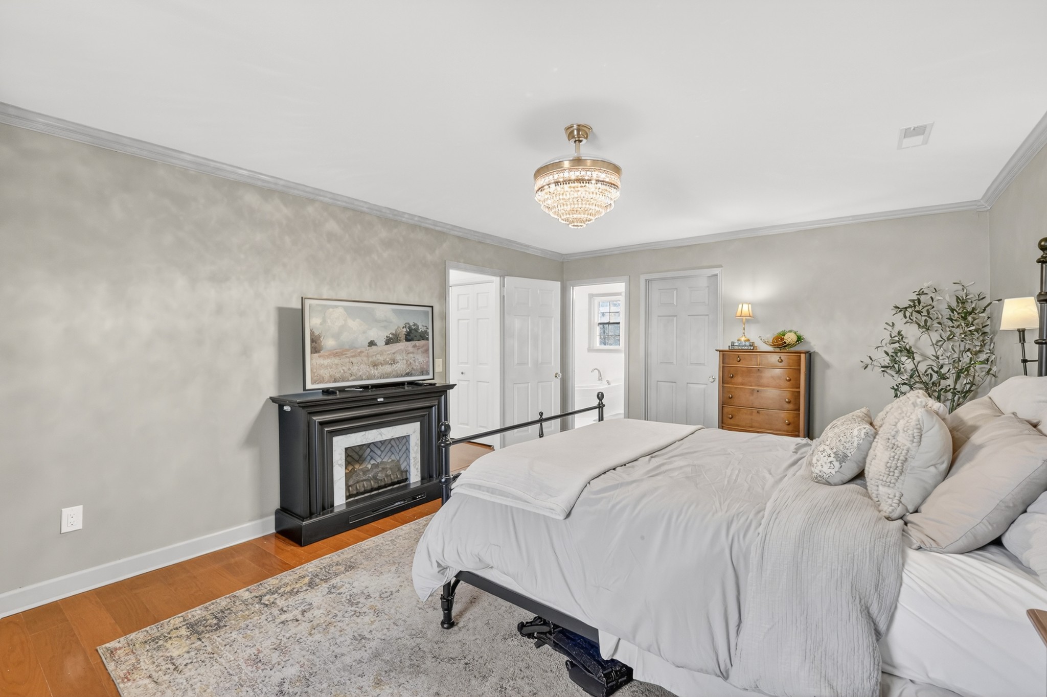 175 Dry Weakley Road Ethridge, TN 38456 - Photo 24 of 49 a bedroom with a bed and a couch