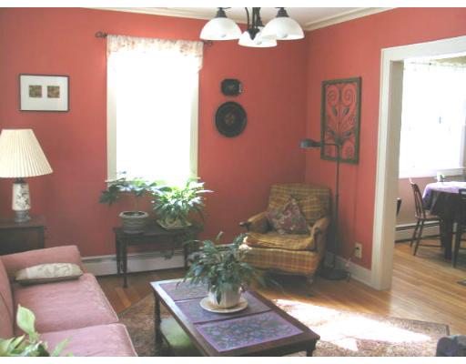 188 Sugar Road Bolton, MA 01740 - Photo 4 of 23 a living room with furniture chandelier and a rug