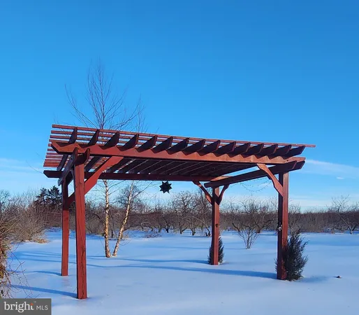 a view of under a patio with a table and chairs