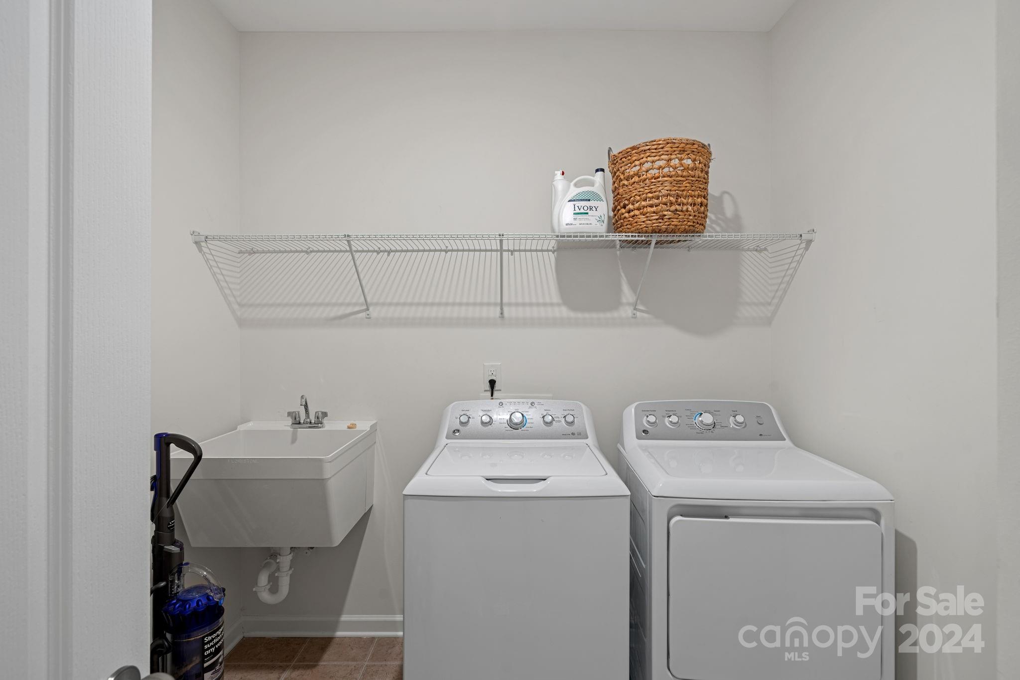 612 Amber Meadows Way Fort Mill, SC 29708 - Photo 16 of 34 a utility room with dryer and washer