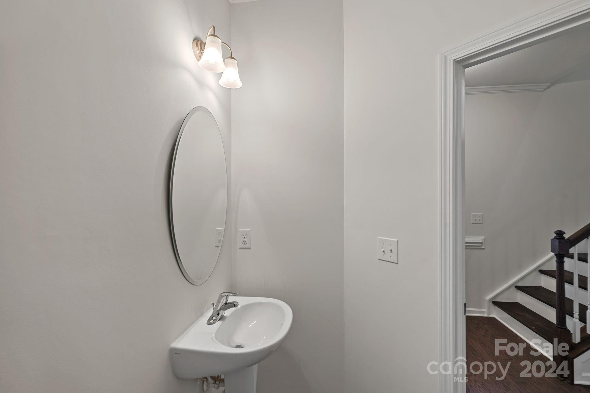 612 Amber Meadows Way Fort Mill, SC 29708 - Photo 17 of 34 a bathroom with a sink and a mirror