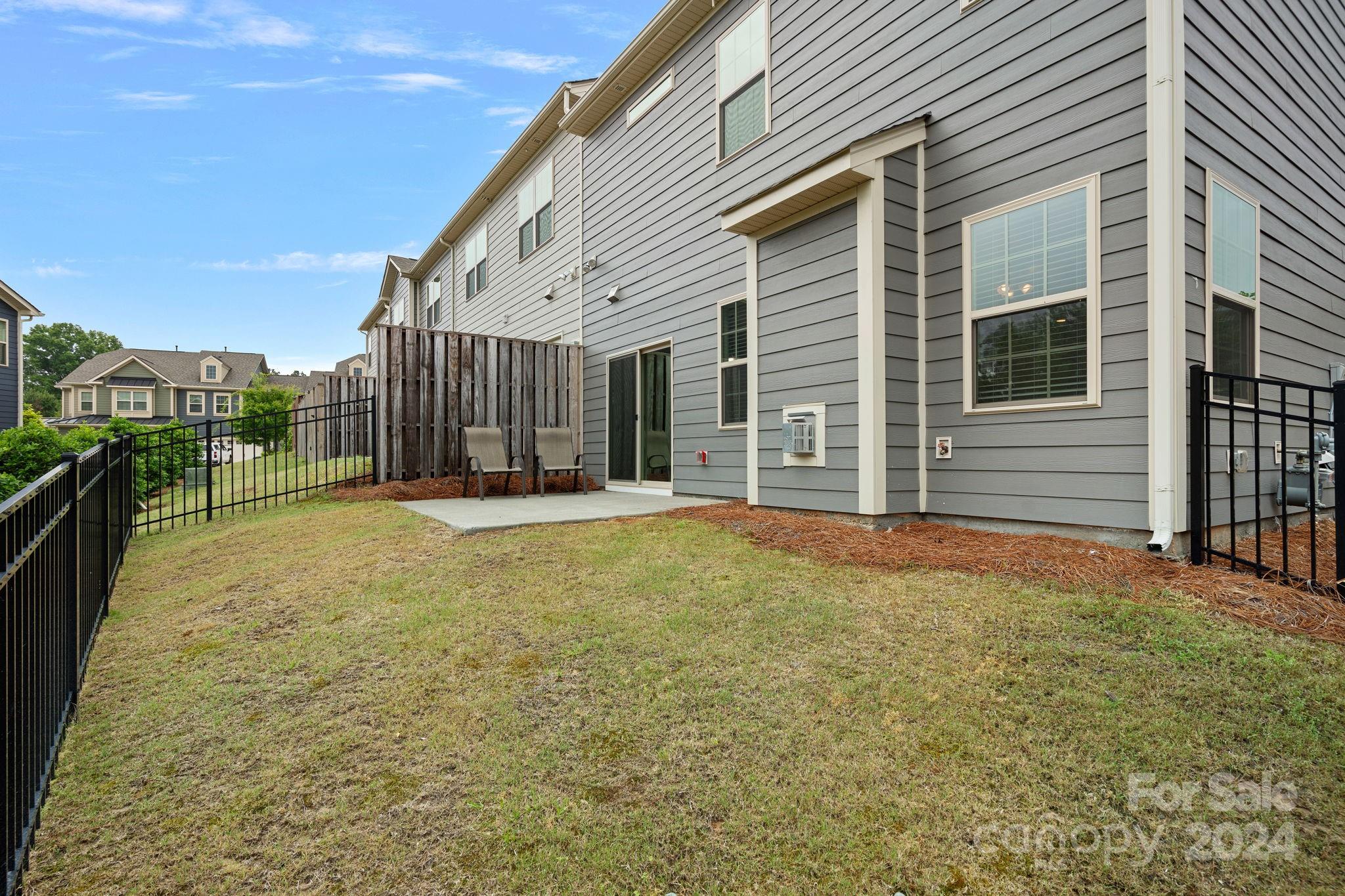 612 Amber Meadows Way Fort Mill, SC 29708 - Photo 23 of 34 a view of a house with a outdoor space