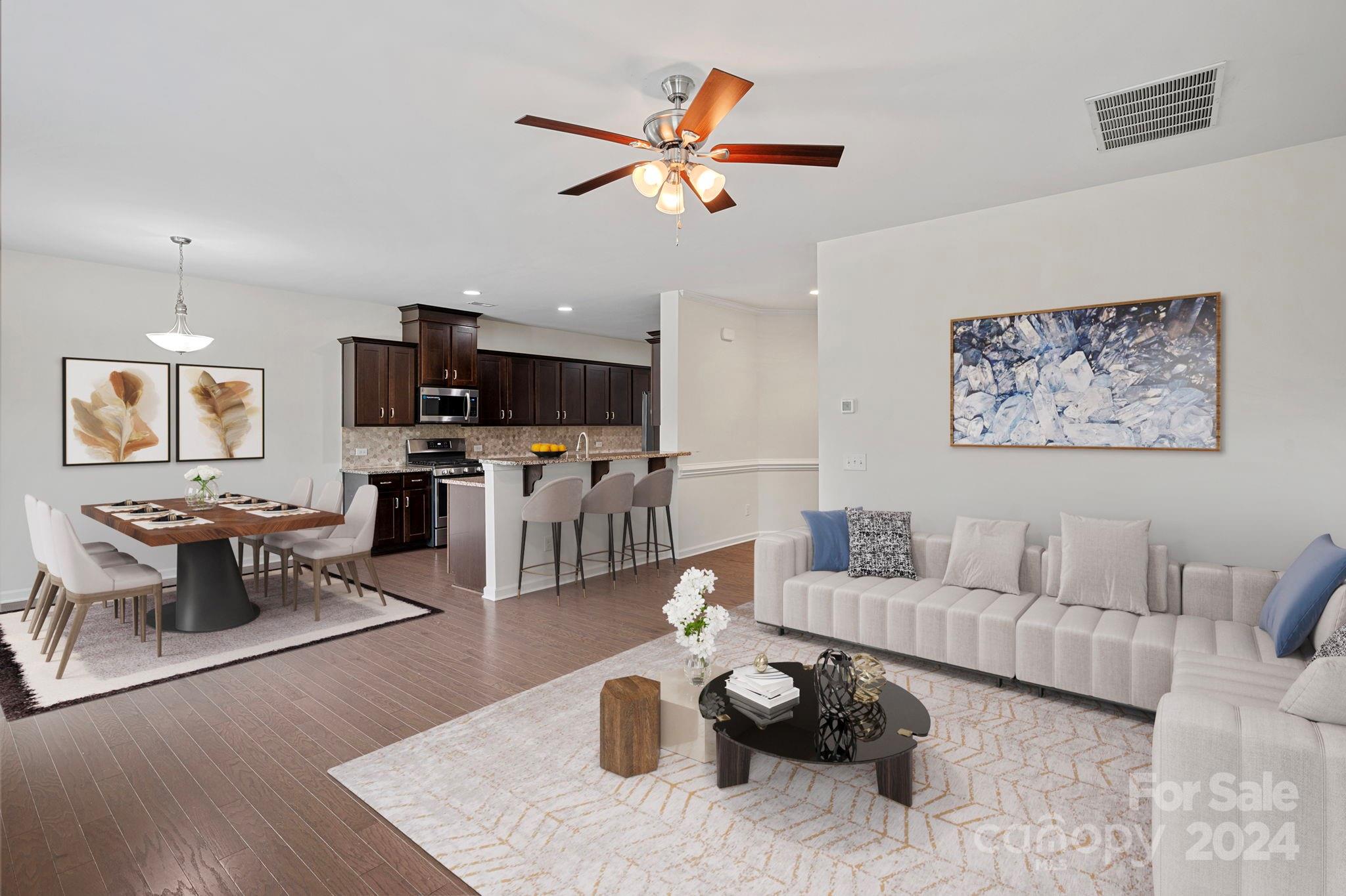 612 Amber Meadows Way Fort Mill, SC 29708 - Photo 8 of 34 a living room with furniture and kitchen view