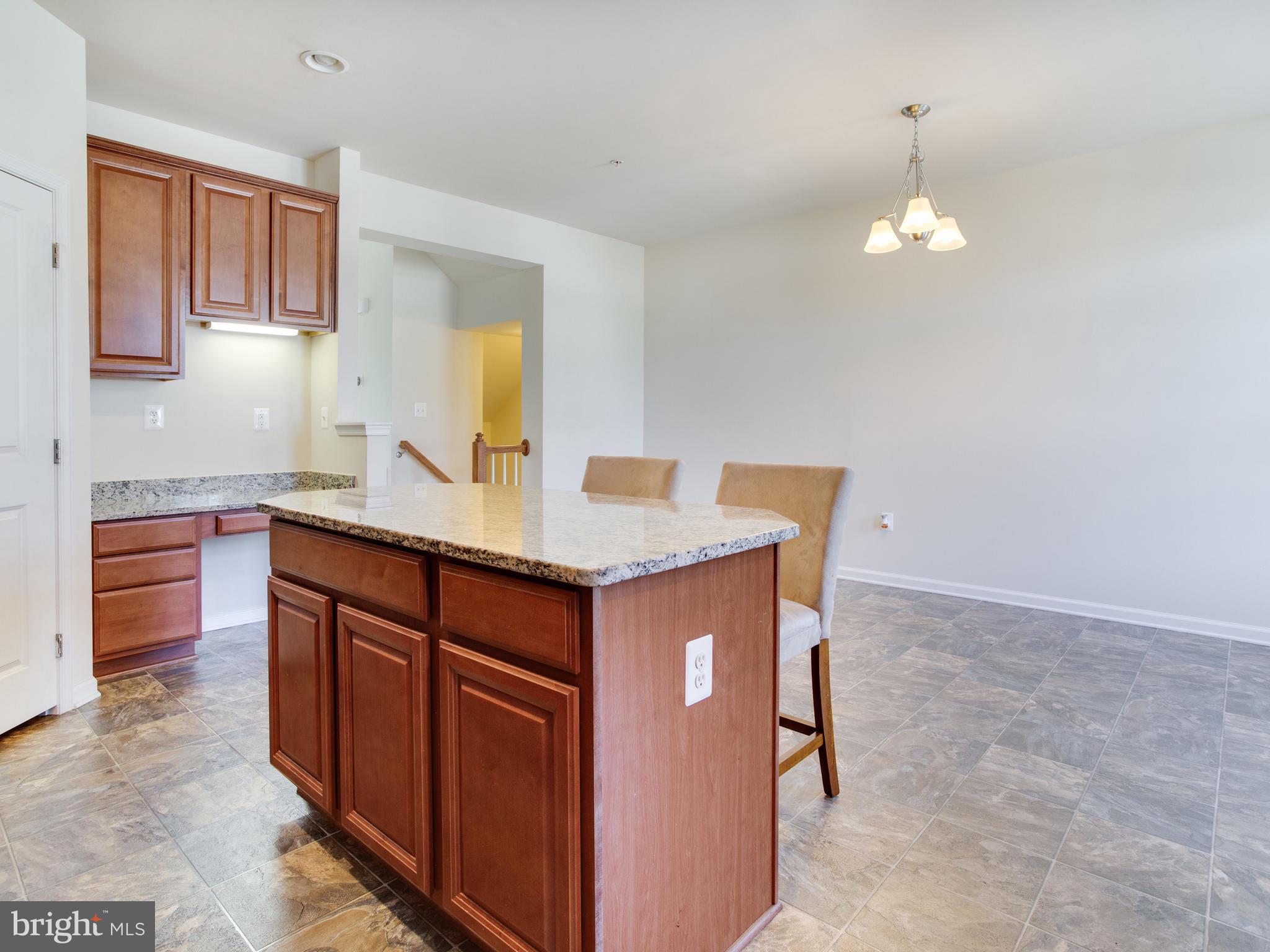 2416 Baileys Pond Road Accokeek, MD 20607 - Photo 10 of 52 a bathroom with granite countertop cabinets and a sink