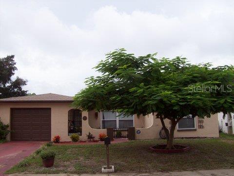 a house view with a outdoor space