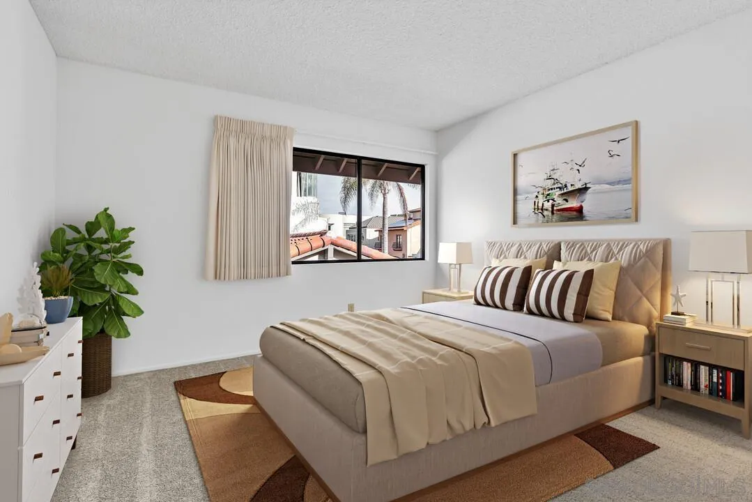 29 Green Turtle Road Coronado, CA 92118 - Photo 46 of 68 a bedroom with a bed and a potted plant