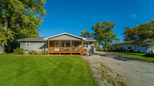 a view of a golf course with a lake view