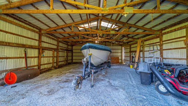 a view of a house with backyard and garden