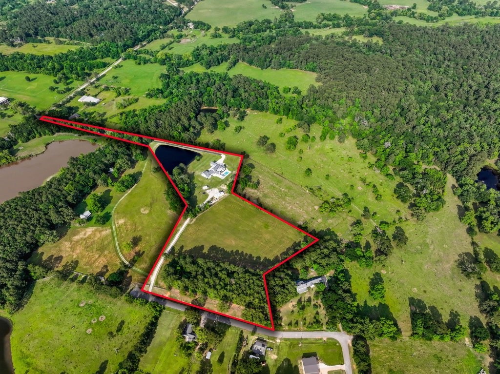 18875 Rabon Chapel Road Montgomery, TX 77316 - Photo 43 of 45 Aerial view with est boundary lines
of this one of a kind property!