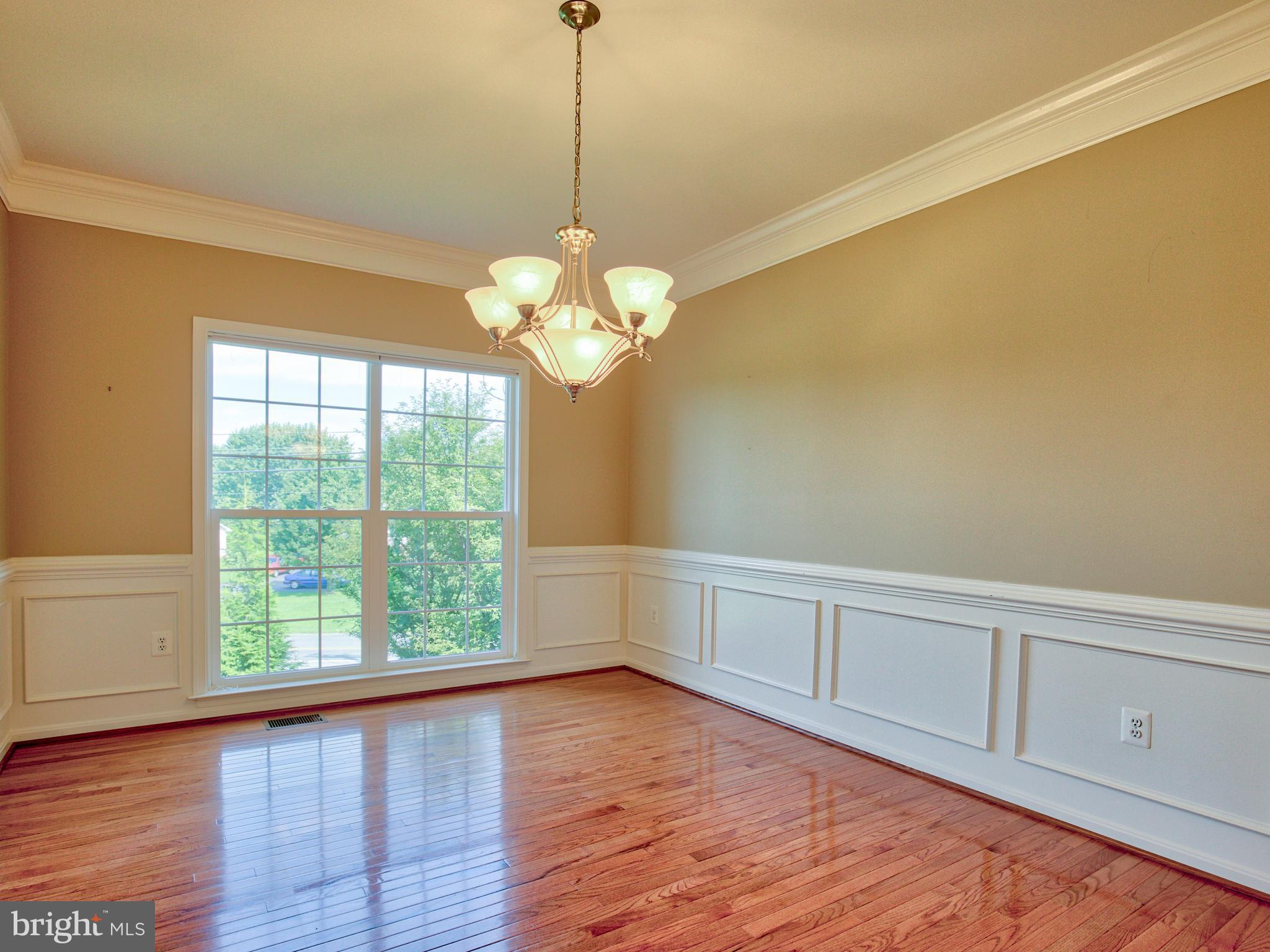 2801 Ridgetop Court Winchester, VA 22601 - Photo 14 of 30 Dining and living rooms w/crown molding