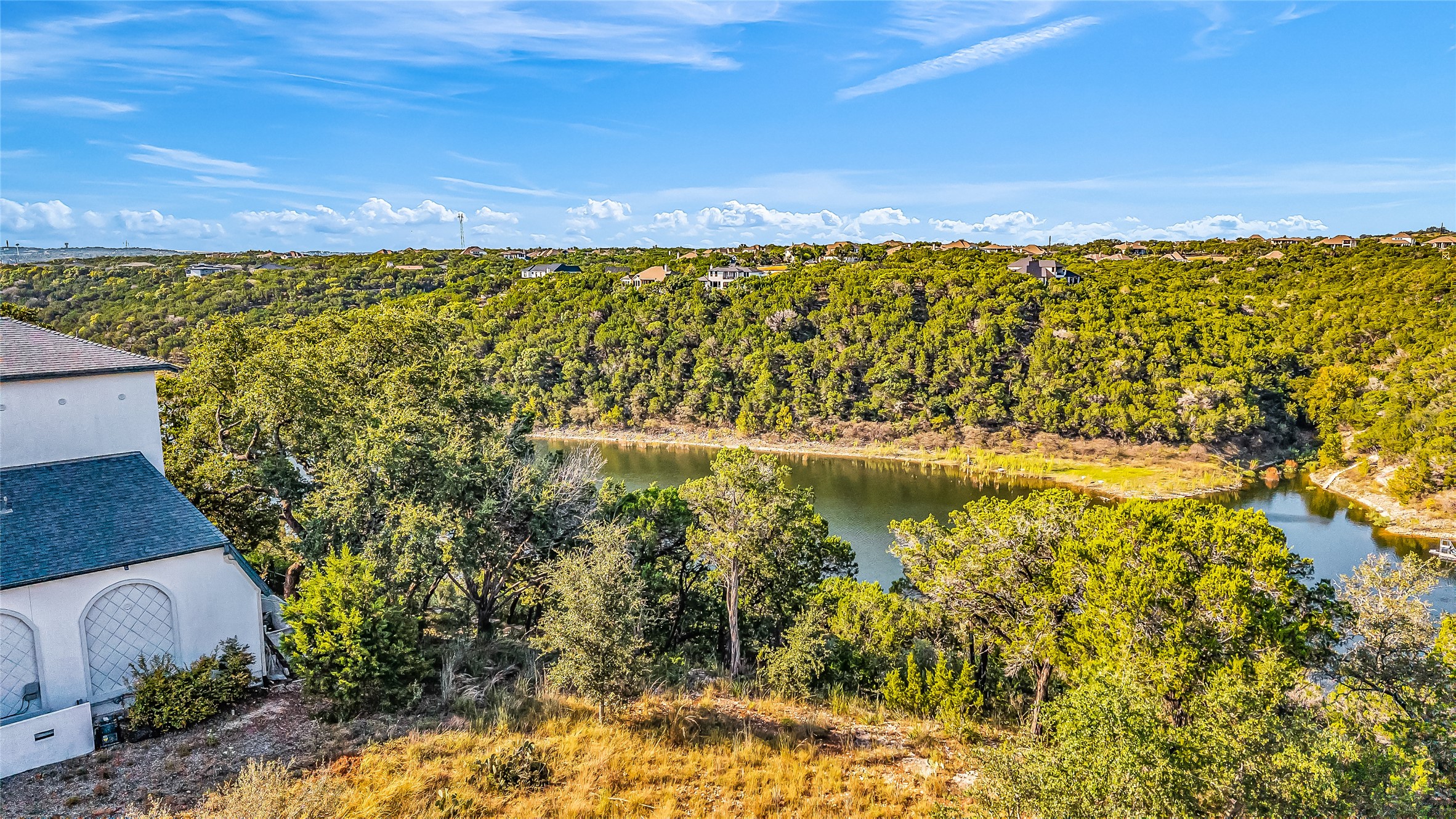7216 Getaway Drive Jonestown, TX 78645 - Photo 17 of 30 Drone / aerial view of a nearby body of water