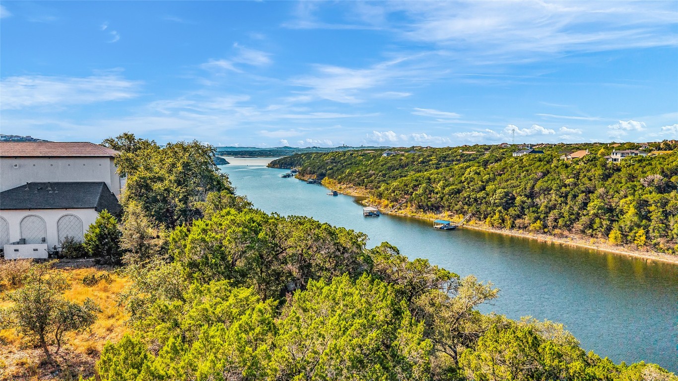 7216 Getaway Drive Jonestown, TX 78645 - Photo 25 of 30 a view of a lake with a city