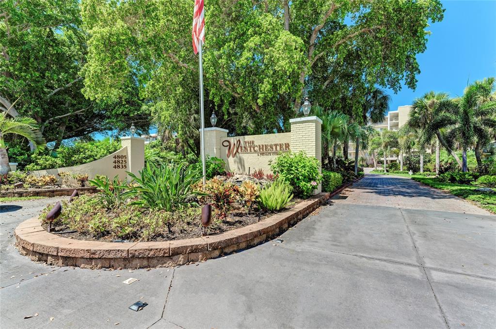 4825 Gulf Of Mexico Drive, Unit 201 Longboat Key, FL 34228 - Photo 29 of 42 a view of a garden