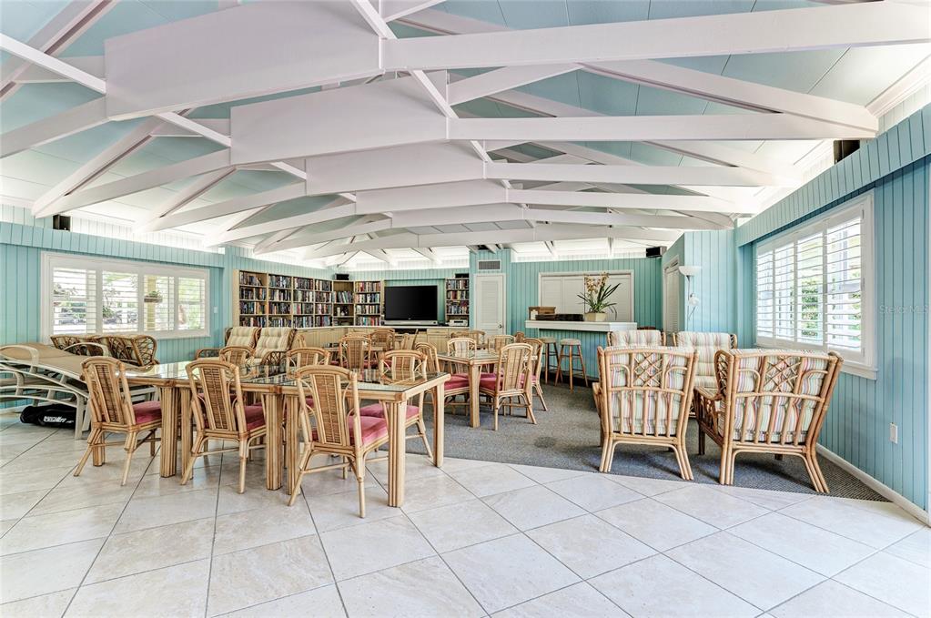 4825 Gulf Of Mexico Drive, Unit 201 Longboat Key, FL 34228 - Photo 31 of 42 a view of a dining room with furniture window and outside view