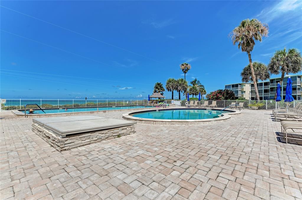 4825 Gulf Of Mexico Drive, Unit 201 Longboat Key, FL 34228 - Photo 38 of 42 a view of a house with a outdoor space