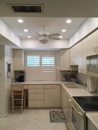 a view of a balcony with furniture