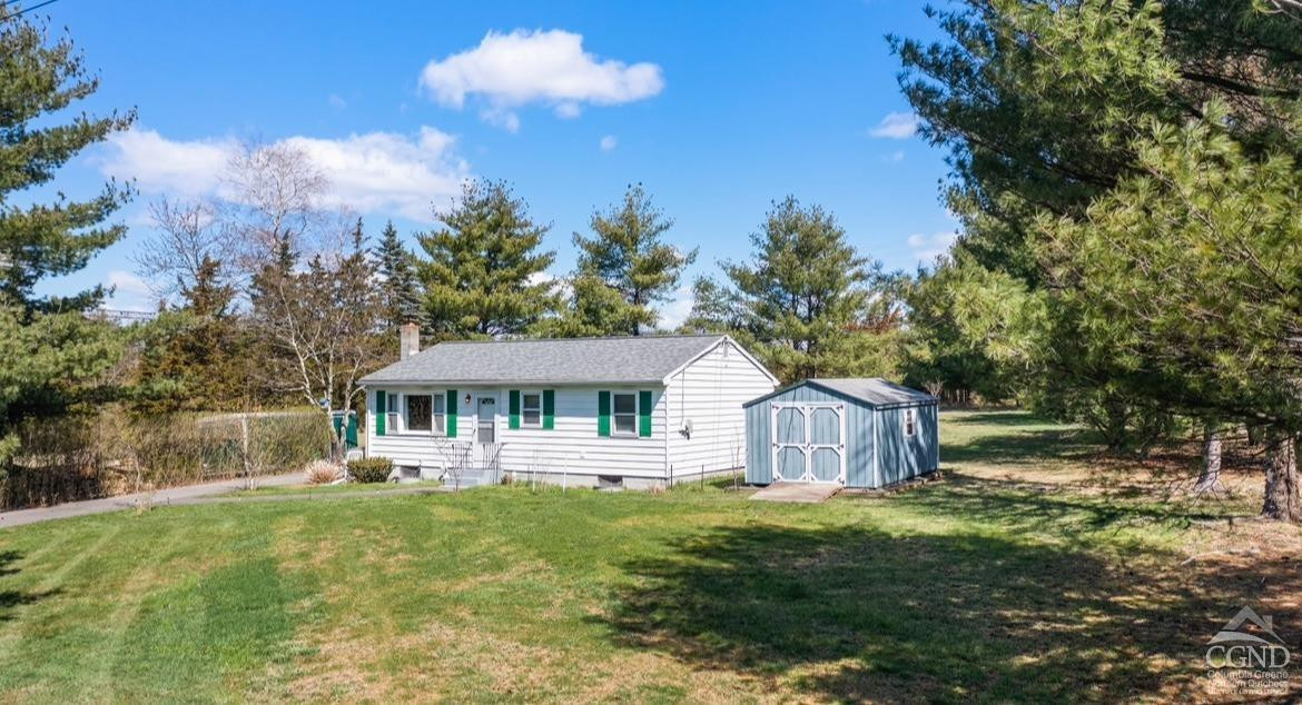 174 Middlefield Road Cairo, NY 12058 - Photo 16 of 22 a view of a house with a yard