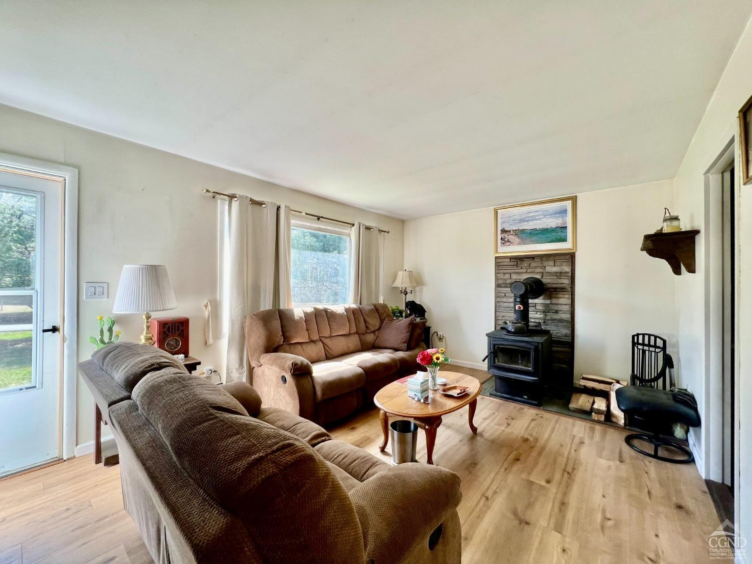 174 Middlefield Road Cairo, NY 12058 - Photo 3 of 22 a living room with furniture and a window